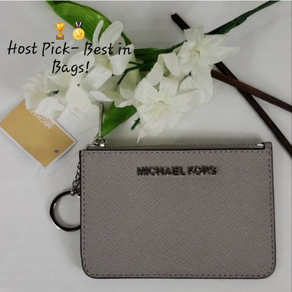 Michael Kors Handbags - SOLD Michael Kors Jet Set Travel Leather Pouch